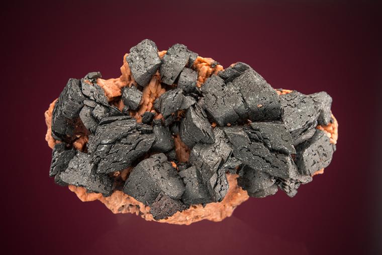 HEMATITE on MICROCLINE